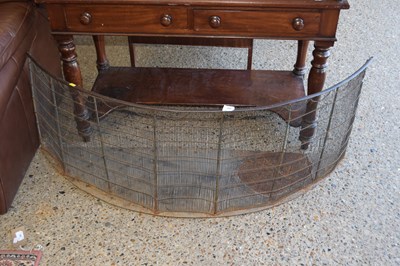 Lot 350 - Georgian iron fire guard of curved form, for...