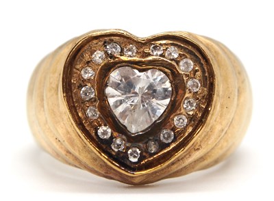 Lot 39 - A 9ct heart shape ring, set with a central...