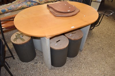 Lot 387 - A retro kitchen table with six barrel formed...