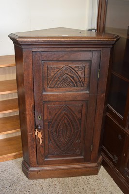 Lot 427 - 19th Century oak corner cabinet with single...