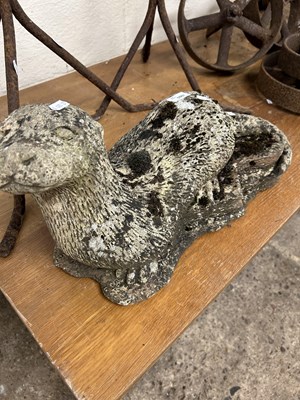 Lot 1007 - Composite garden statue of an otter