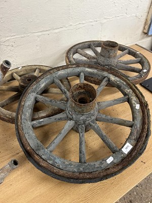 Lot 1011 - Three wooden and iron cartwheels