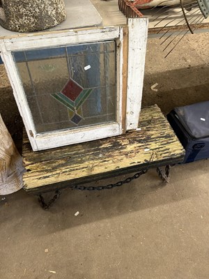 Lot 1068 - A lead window together with an iron and wood...