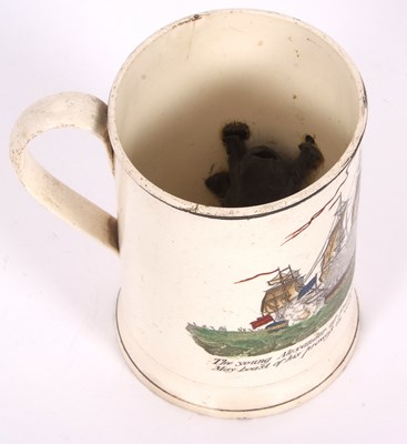 Lot 42 - An early 19th Century cream ware frog mug...