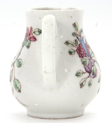 Lot 71 - A small Bow porcelain robin jug with a famille...