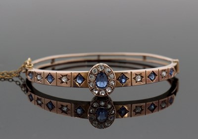 Lot 330 - A late Victorian sapphire and diamond hinged...