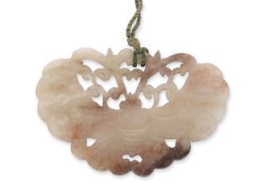 Lot 102 - A Chinese jade pendant carved as a moth,...