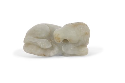 Lot 106 - A jade carving of a horse with some brown...
