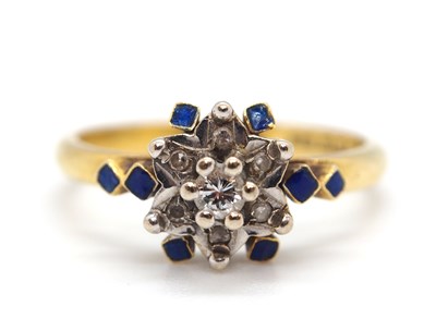 Lot 49 - An 18ct diamond and blue enamel ring, the...