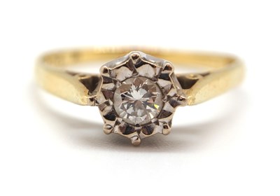 Lot 44 - An 18ct diamond ring, the illusion set round...