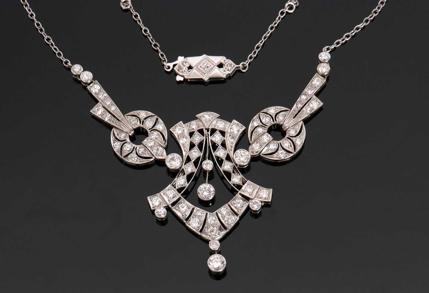 Lot 346 - An Art Deco diamond necklace, set throughout...