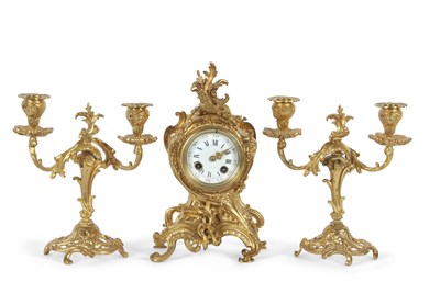 Lot 521 - An early 20th Century French gilt brass clock...