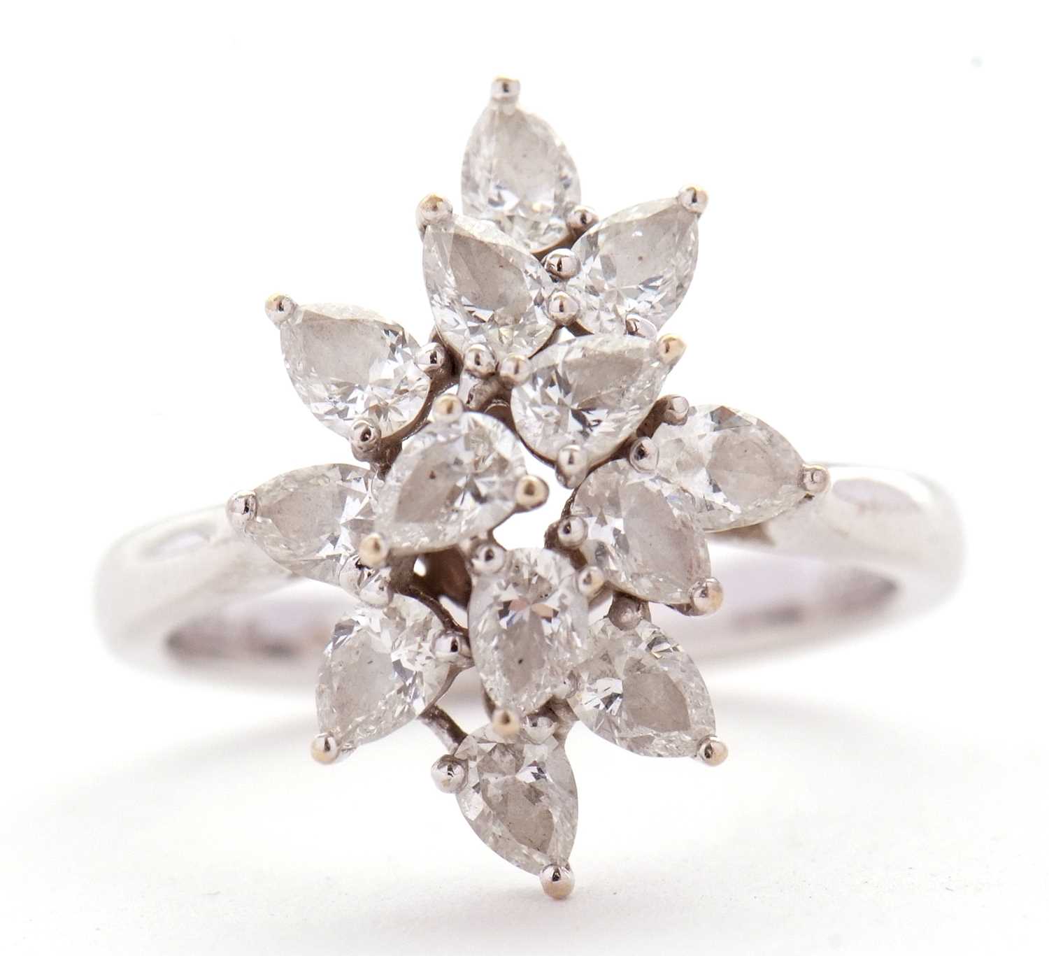 Lot 366 - An 18ct diamond cluster ring, set with twelve...