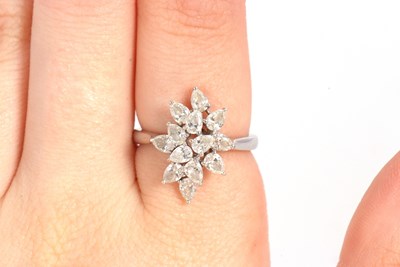 Lot 366 - An 18ct diamond cluster ring, set with twelve...