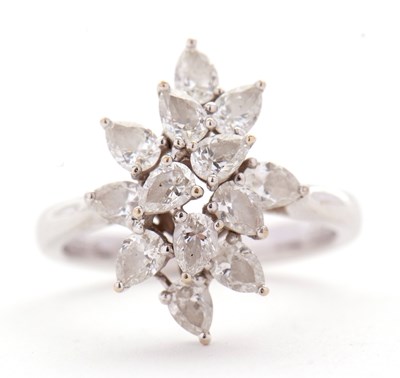 Lot 366 - An 18ct diamond cluster ring, set with twelve...