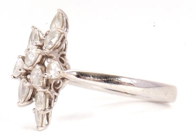 Lot 366 - An 18ct diamond cluster ring, set with twelve...