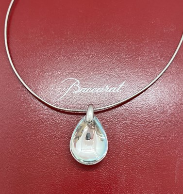 Lot 128 - A Baccarat necklace, the oval glass pendant...