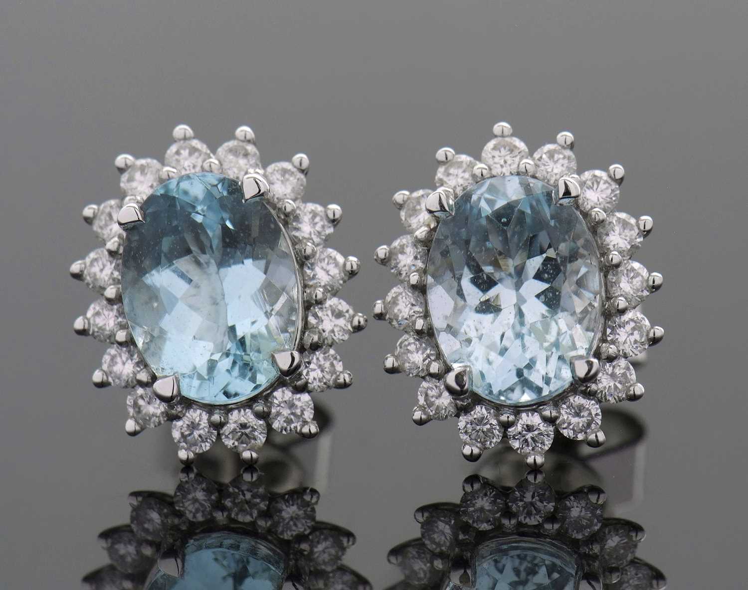 Lot 369 - A pair of 18ct aquamarine and diamond earstuds,...