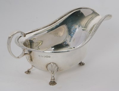 Lot 6 - A George V silver sauce boat of typical form...