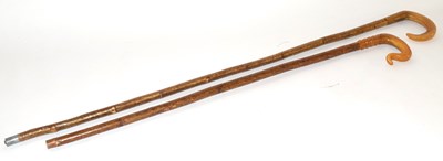 Lot 28 - Two shepherds crooks / walking sticks /...