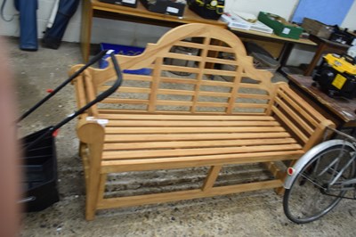 Lot 1065 - An as new wooden garden bench