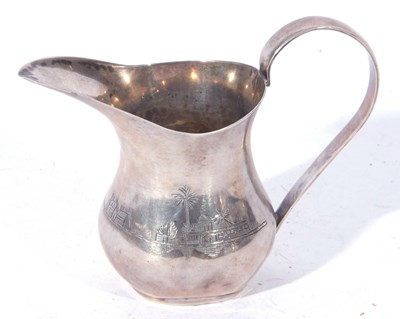 Lot 201 - Egyptian white metal cream jug of baluster...