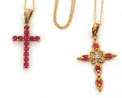 Lot 188 - Two 9ct ruby cross necklaces: the first set...