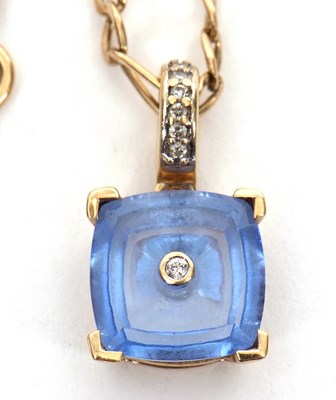 Lot 192 - A 9ct topaz and diamond pendant necklace, the...