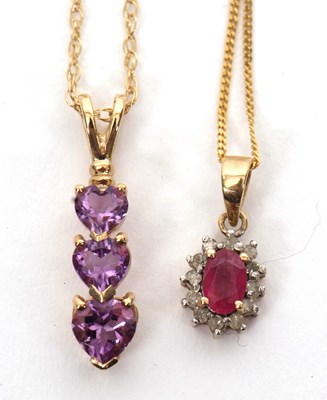 Lot 178 - A 9ct amethyst heart necklace and a 9K ruby...