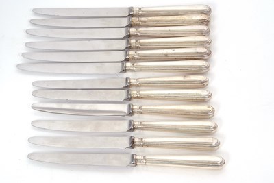 Lot 27 - Six silver handled table knives, six silver...