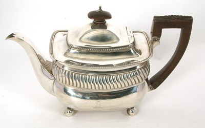 Lot 37 - A George III silver teapot of oval form having...
