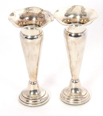 Lot 50 - Pair of George V silver trumpet vases having...