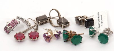 Lot 385 - Seven pairs of silver gemset earrings: to...