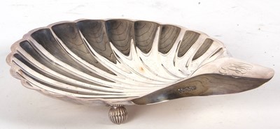 Lot 60 - Large silver shell shaped dish, the handle...