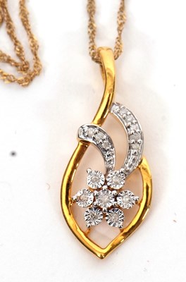 Lot 194 - A 9ct diamond pendant and chain, the leaf...