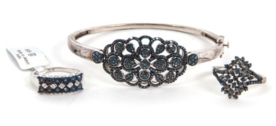 Lot 401 - Two treated blue diamond rings and similar...