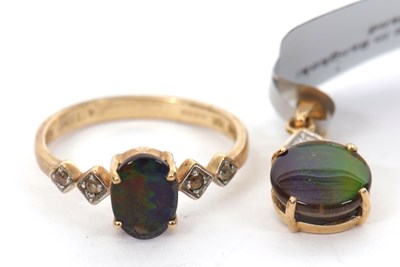 Lot 216 - A 9ct opal triplet ring and a matching 10K...