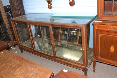 Lot 549 - An early 20th Century shop display cabinet...