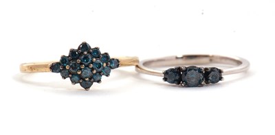 Lot 98 - Two 9ct treated blue diamond rings: to include...