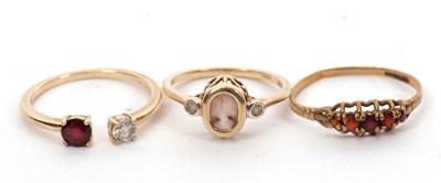 Lot 128 - Three 9ct gemset rings: to include a 9ct five...