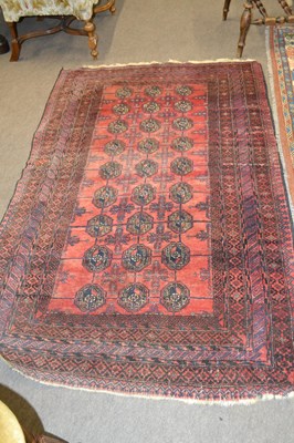 Lot 387 - 20th century Bokhara type floor rug with red...