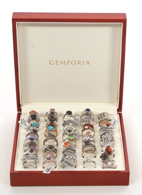 Lot 437 - A case of silver and gemset rings, to include...