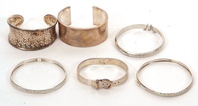 Lot 423A - A quantity of silver bangles, to include a...