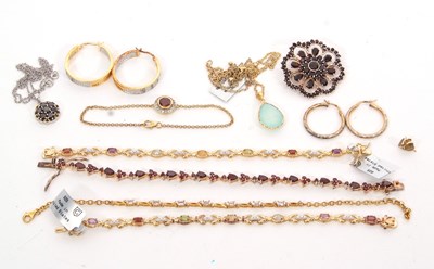 Lot 391 - A quantity of silver gilt and gemset jewellery:...