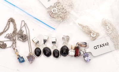 Lot 405 - Nine silver and gemstone pendants: to include...