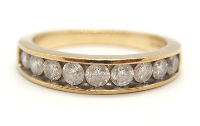 Lot 37 - A 9ct diamond ring, the upper half set with...