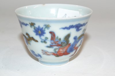 Lot 263 - A small Chinese porcelain wine cup with a...