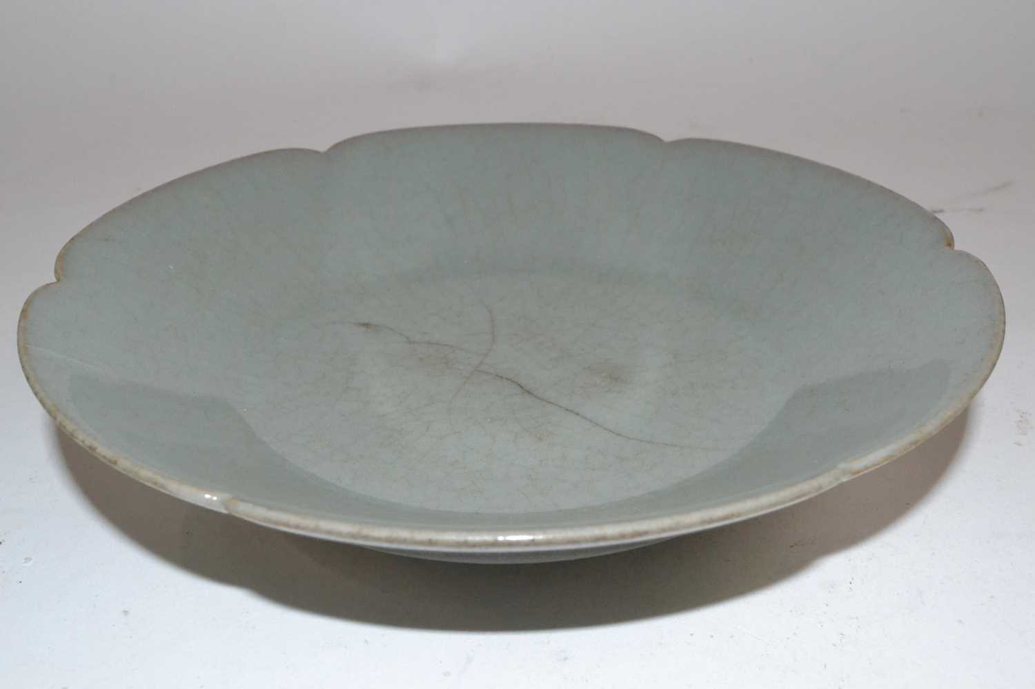 Lot 272 - A Chinese celadon dish of metal shape possibly...