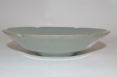 Lot 272 - A Chinese celadon dish of metal shape possibly...