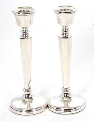 Lot 106 - A pair of silver hallmarked candlesticks...